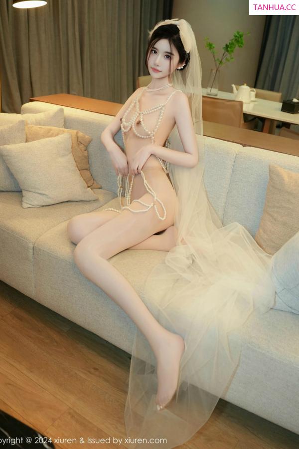   [XiuRen]高清写真图 2024.12.27 No.9674 Erikaki 情趣婚纱第49张图片